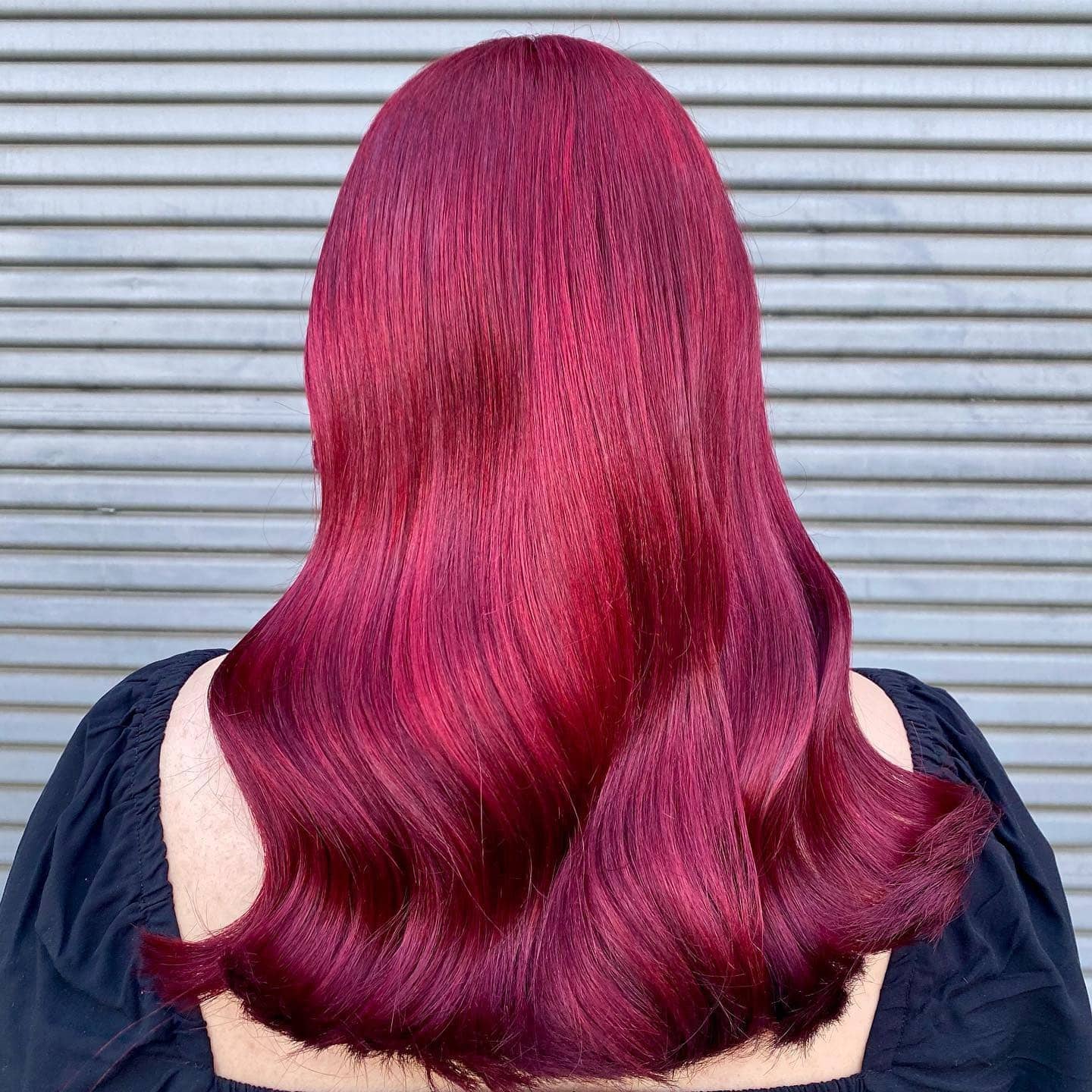 4. Sleek Cherry Red with Sculpted Ends - Deep Red Hair Color