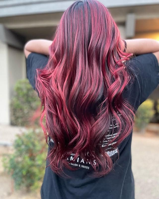 5. Rose-Infused Red Balayage Waves - Deep Red Hair Color