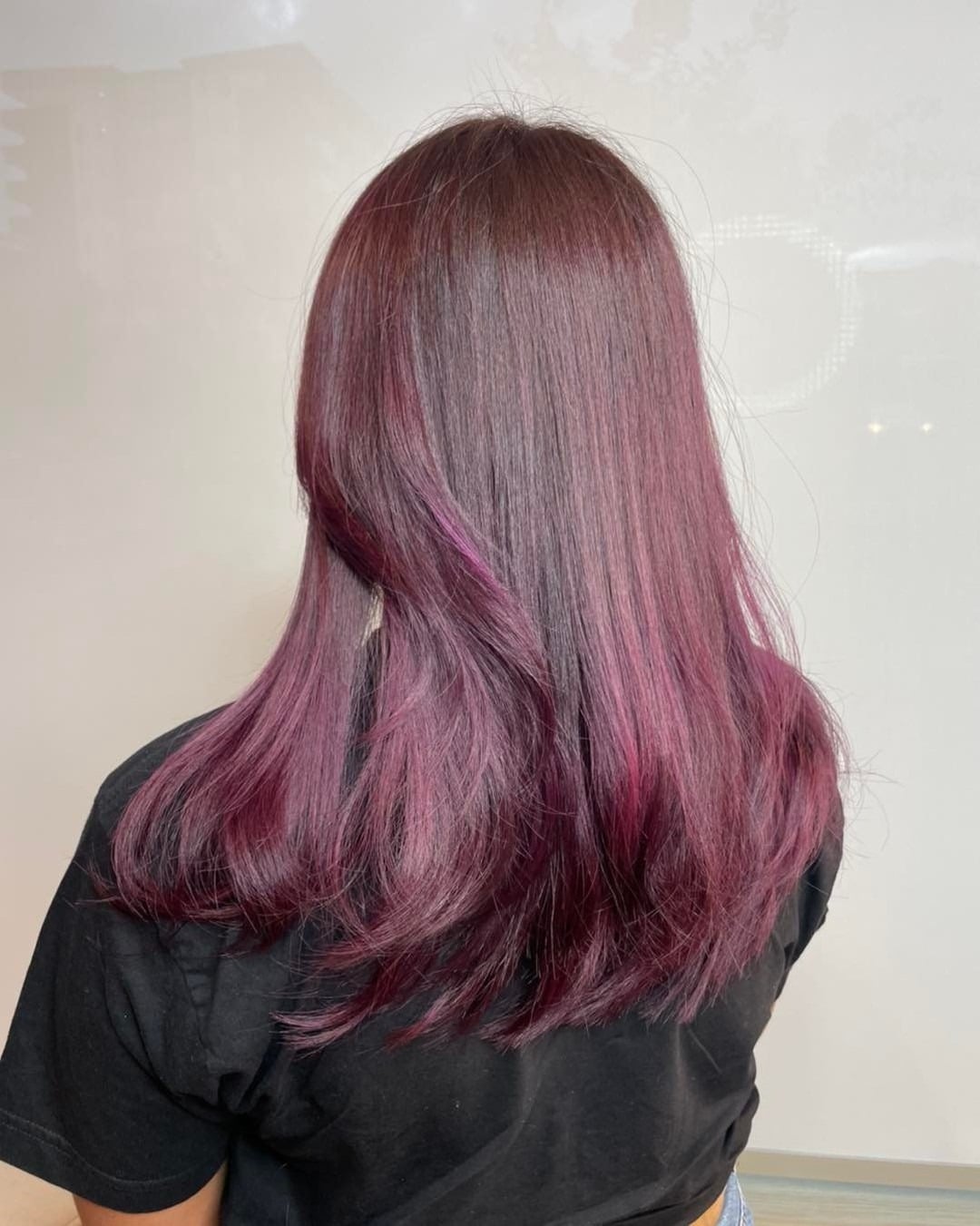 7. Muted Plum Red with Airy Movement - Deep Red Hair Color