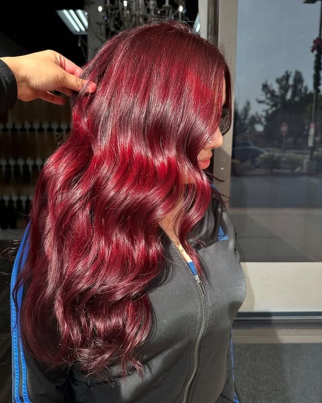 14. Glossy Deep Cherry Waves with Seamless Depth - Deep Red Hair Color