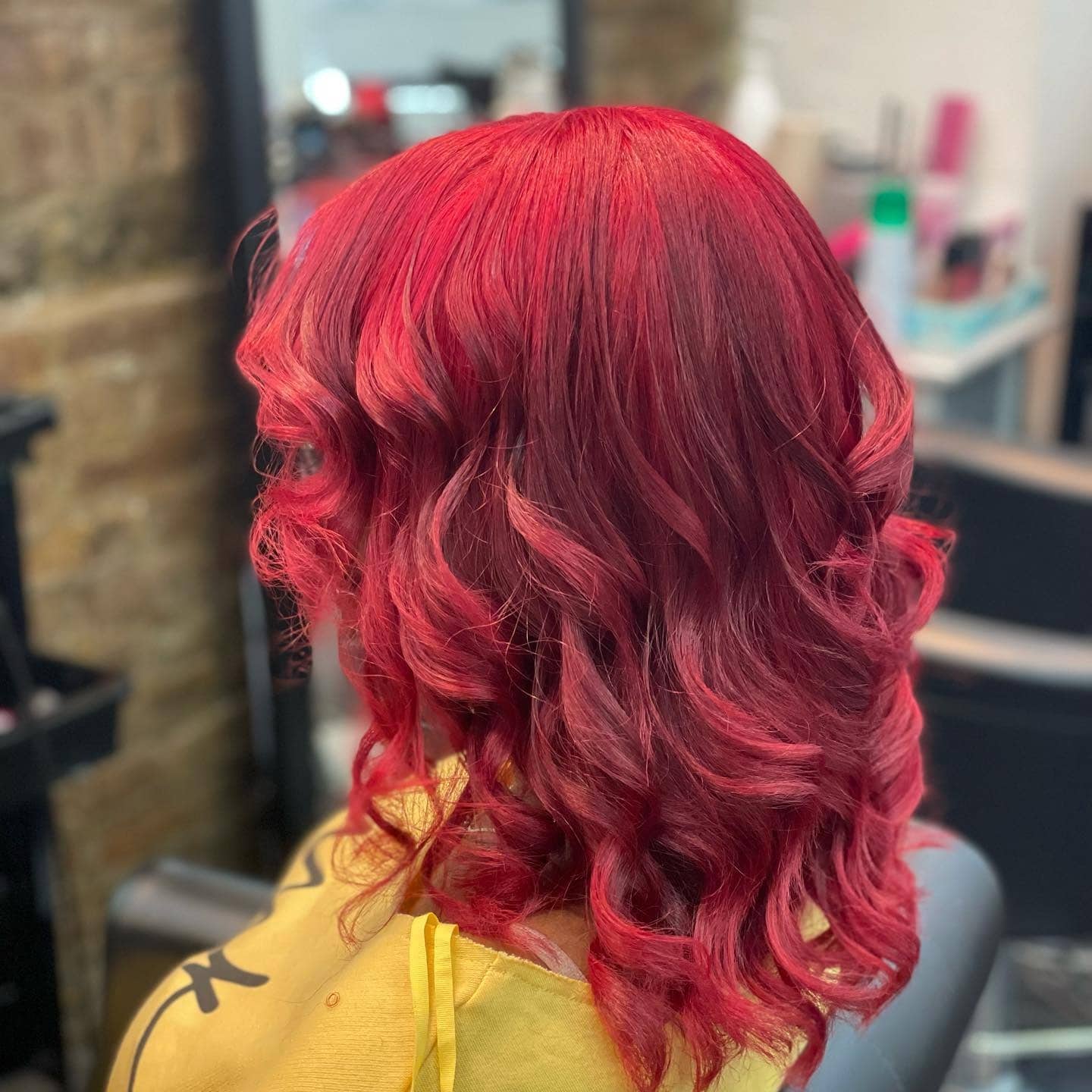 15. Textured Mid-Length Cut in Bright Crimson Red - Deep Red Hair Color