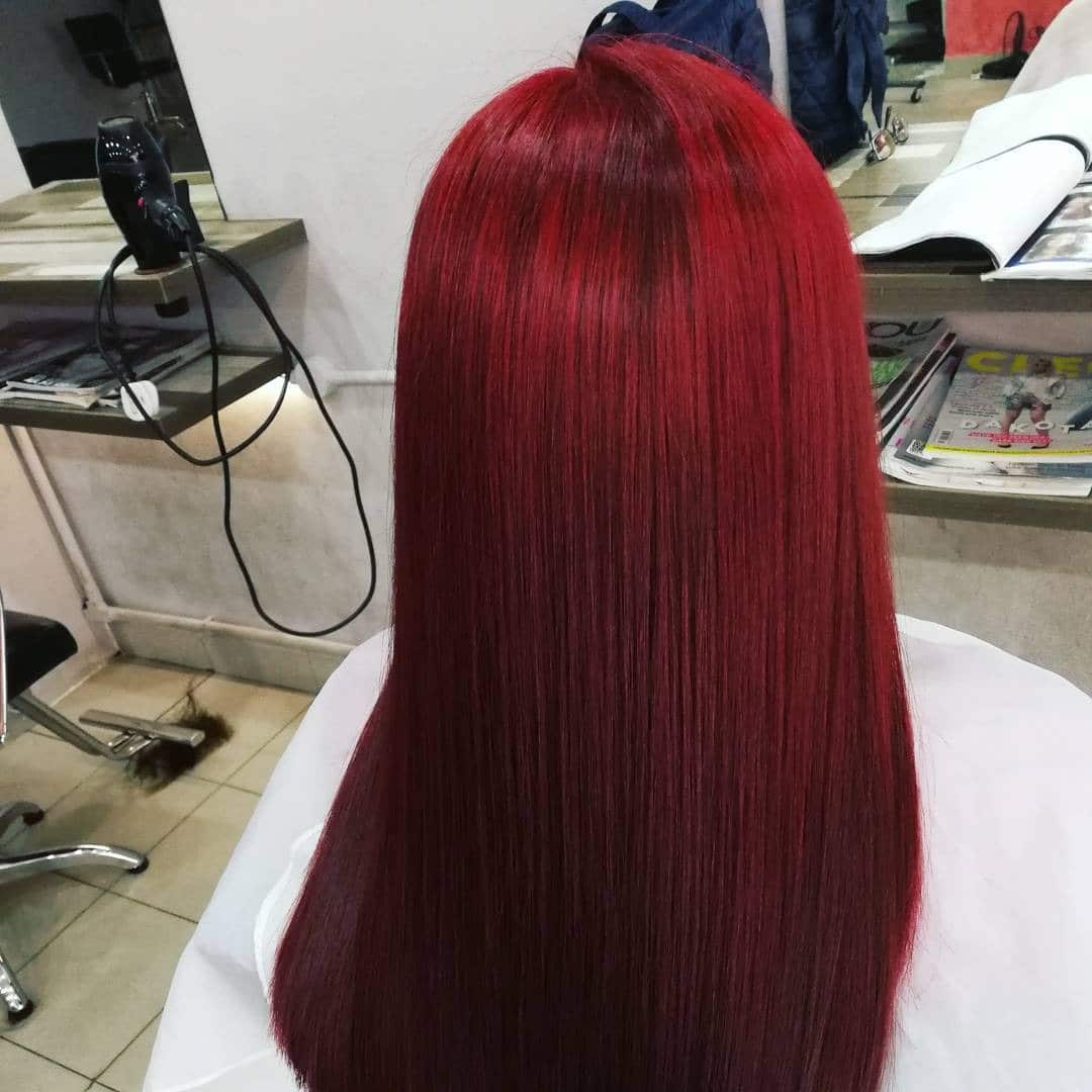 19. Sleek Lengths with Cool-Toned Red Wine Finish - Deep Red Hair Color