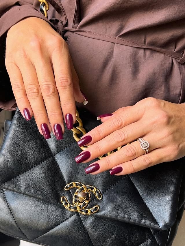 22. Classic Gloss Almond Nails in Deep Wine - luxury nail ideas
