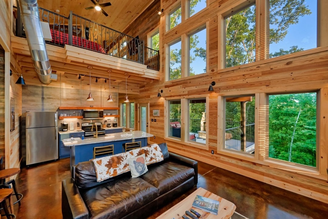 11. Rustic Loft Open Kitchen Living with Honey Wood and Matte Black - open kitchen living room ideas