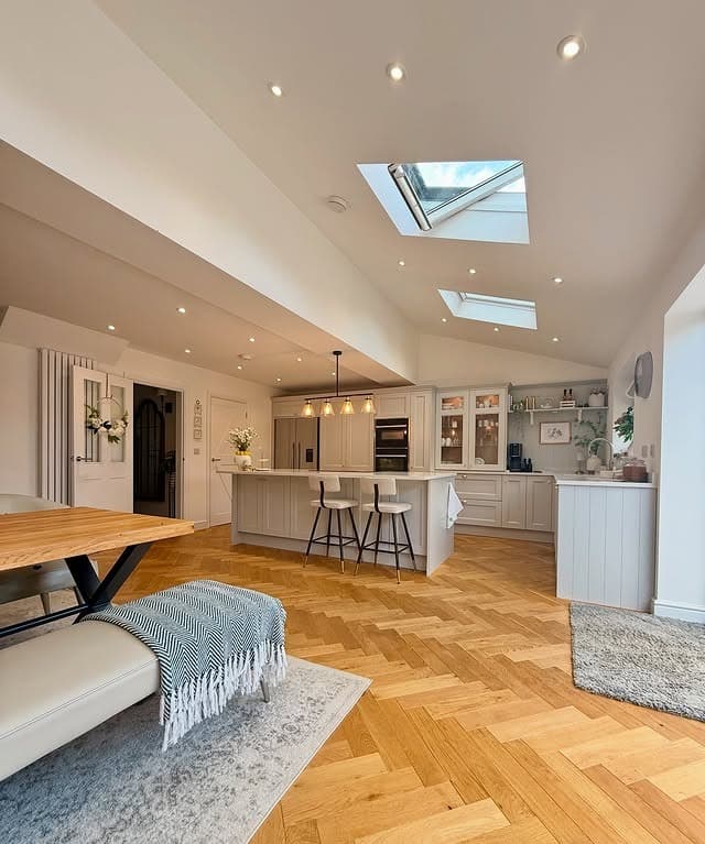 12. Soft Contemporary Open Living with Cream and Natural Oak - open kitchen living room ideas