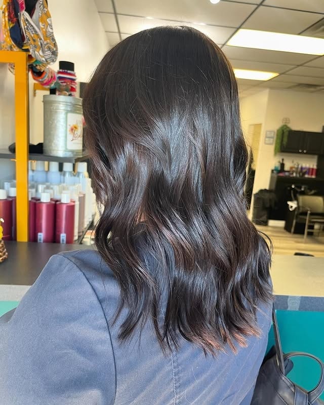 8. Natural Shoulder-Length Waves with Soft Chocolate Highlights - Black Hair with Highlights