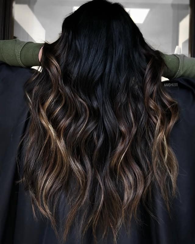 9. Long Layered Waves with Honey Brown Dimension - Black Hair with Highlights