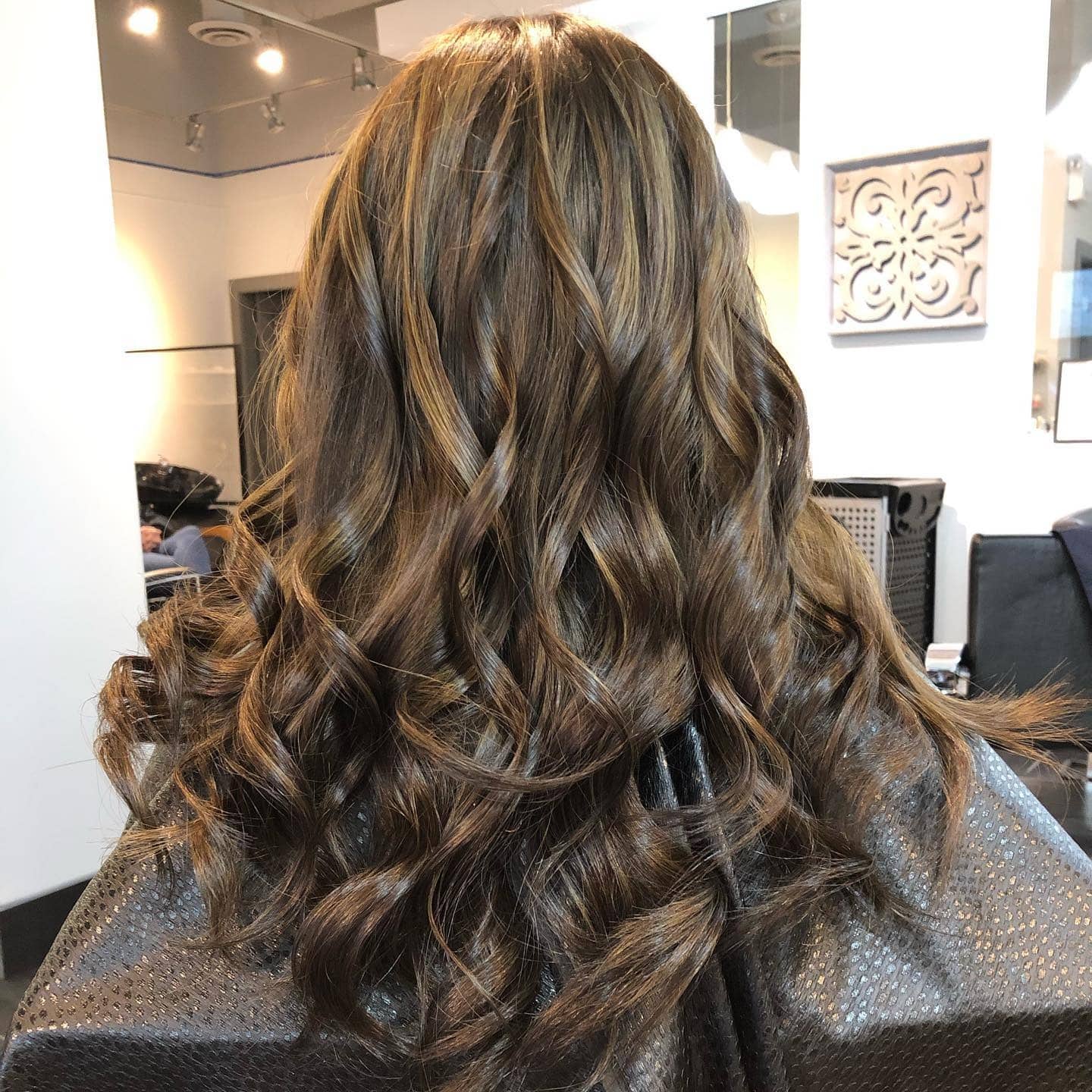 10. Classic Loose Waves with Golden Brown Highlights - Black Hair with Highlights