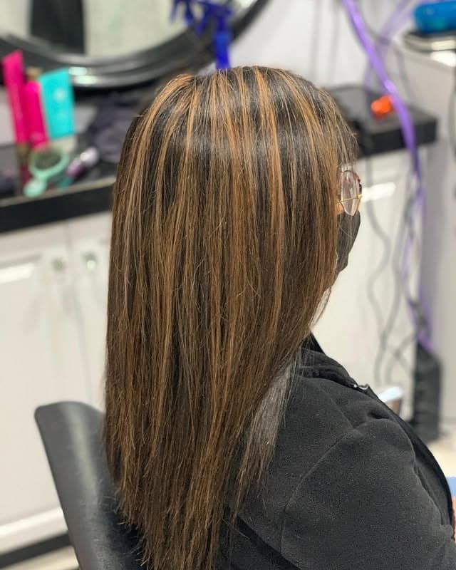 12. Shoulder-Length Straight Cut with Golden Brown Highlights - Black Hair with Highlights