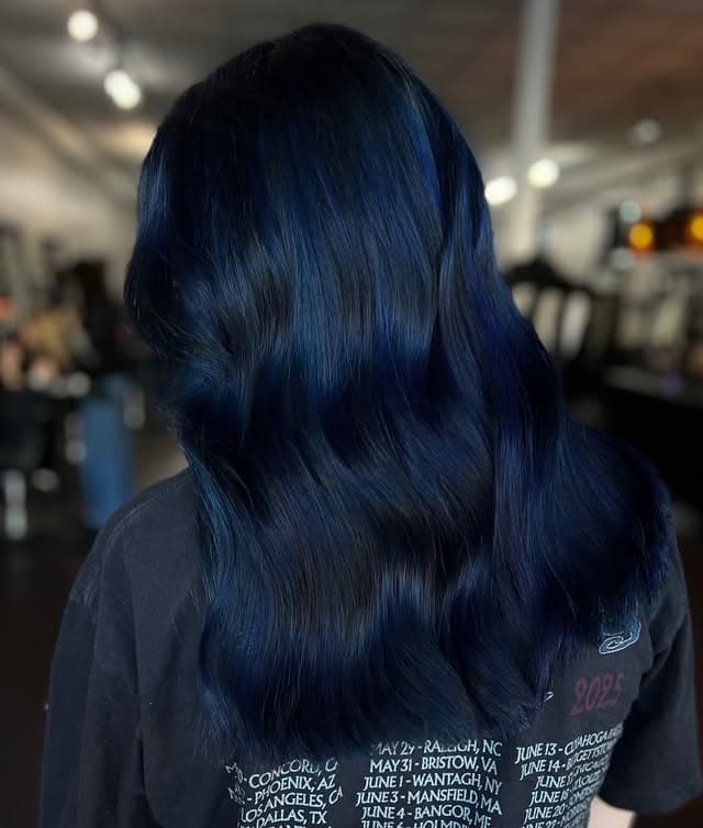 15. Glossy Waves with Deep Blue Accents - Black Hair with Highlights