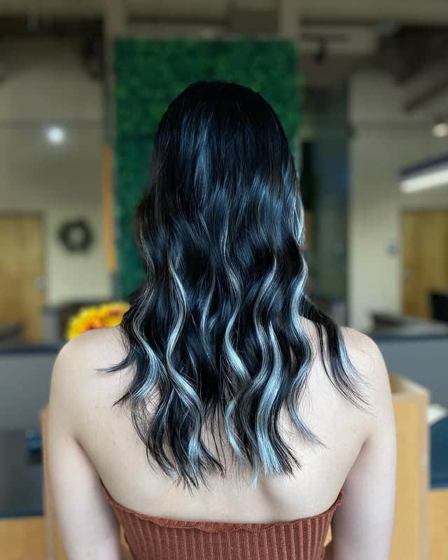 22. Shoulder-Length Waves with Cool Silver Accents - Black Hair with Highlights