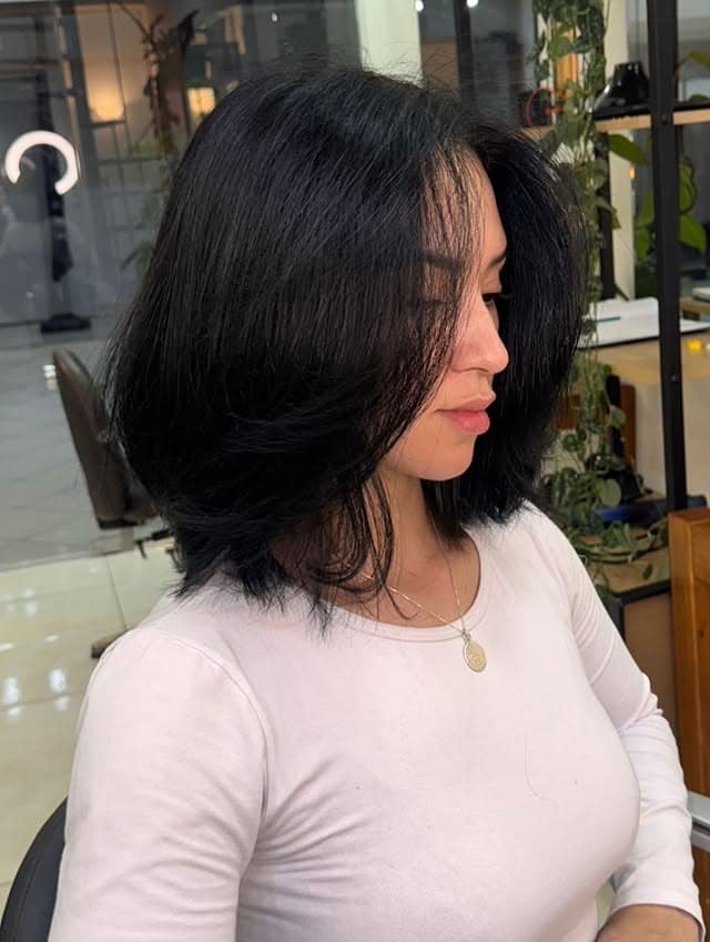 20. Feathered Bob with Lift in Jet Black - Bob Hairstyles