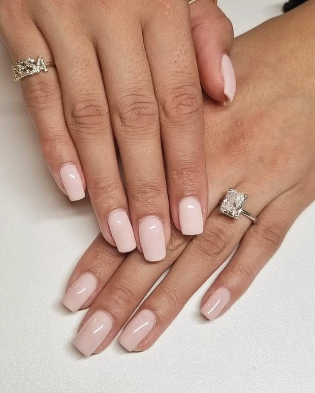 1. Soft Blush Classic Coffin Nails - medium length coffin nail ideas