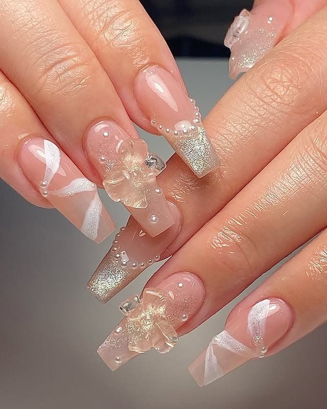 2. Pearl-Embellished Nude Coffin Nails - medium length coffin nail ideas