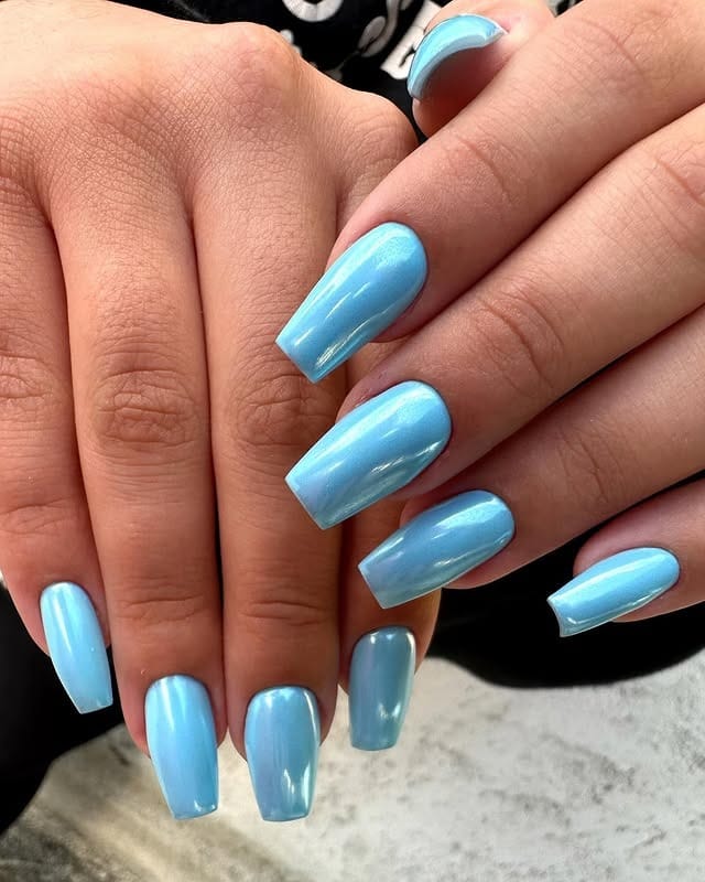 4. Sky Blue Gloss Coffin Nails - medium length coffin nail ideas