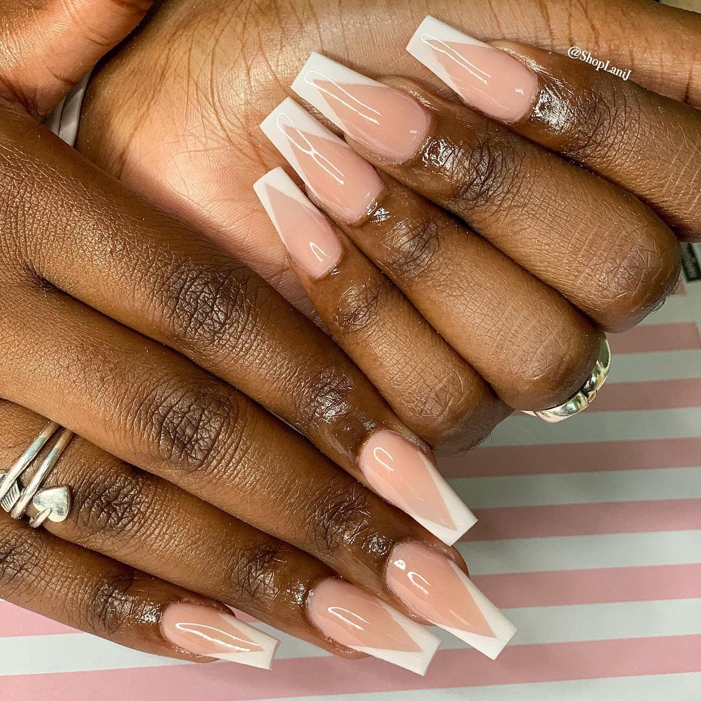 10. French Tip Nude Coffin Nails with Sharp Lines - medium length coffin nail ideas