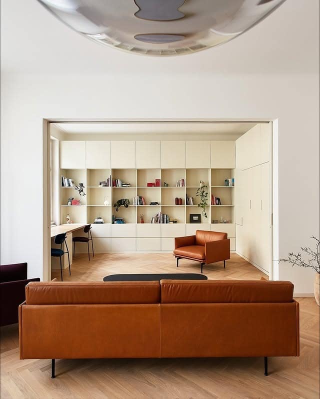 3. Modern Library Living Room Office in Cream and Cognac - living room office ideas