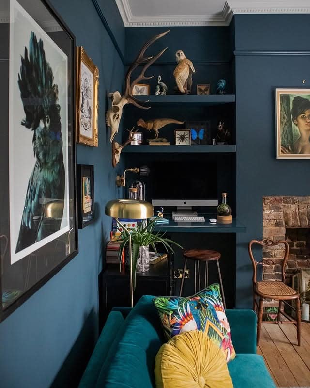 5. Moody Eclectic Living Room Office in Deep Blue and Brass - living room office ideas