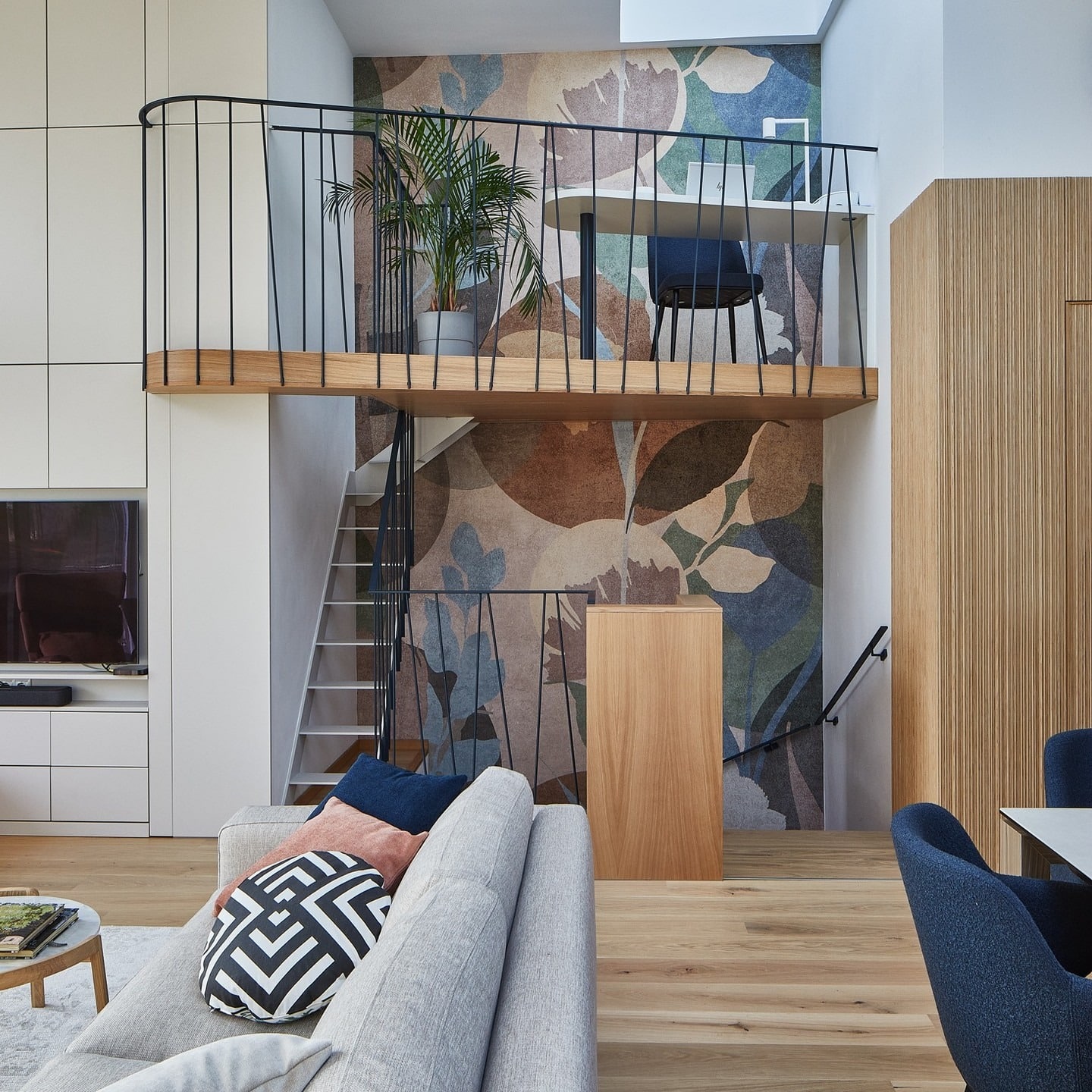 12. Loft-Style Living Room Office in Natural Oak and Muted Blue - living room office ideas