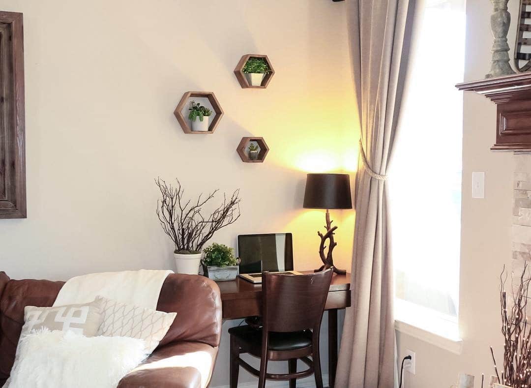 15. Cozy Corner Living Room Office in Warm Brown and Cream - living room office ideas