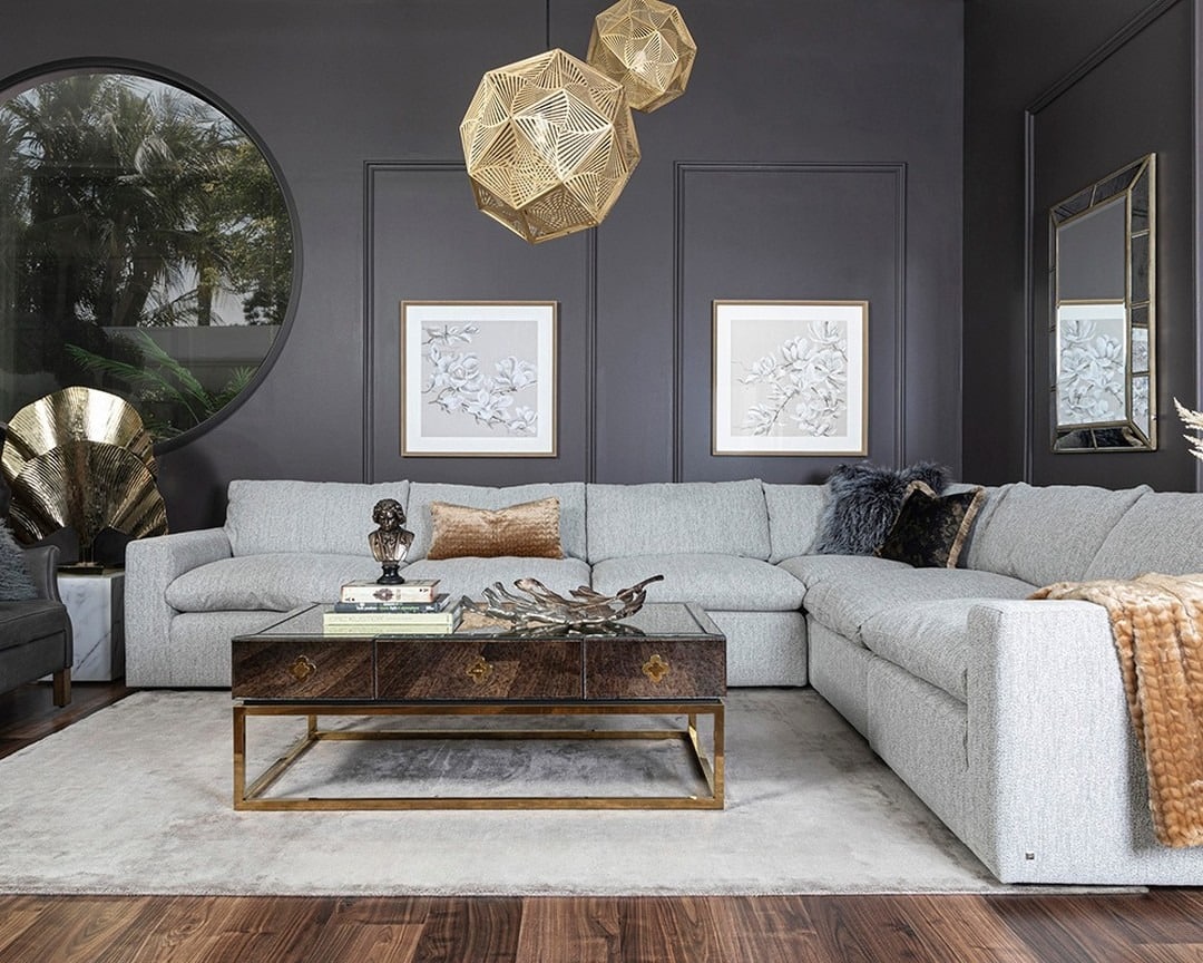 13. Charcoal Grey Living Room with Architectural Gold Details - grey and gold living room ideas