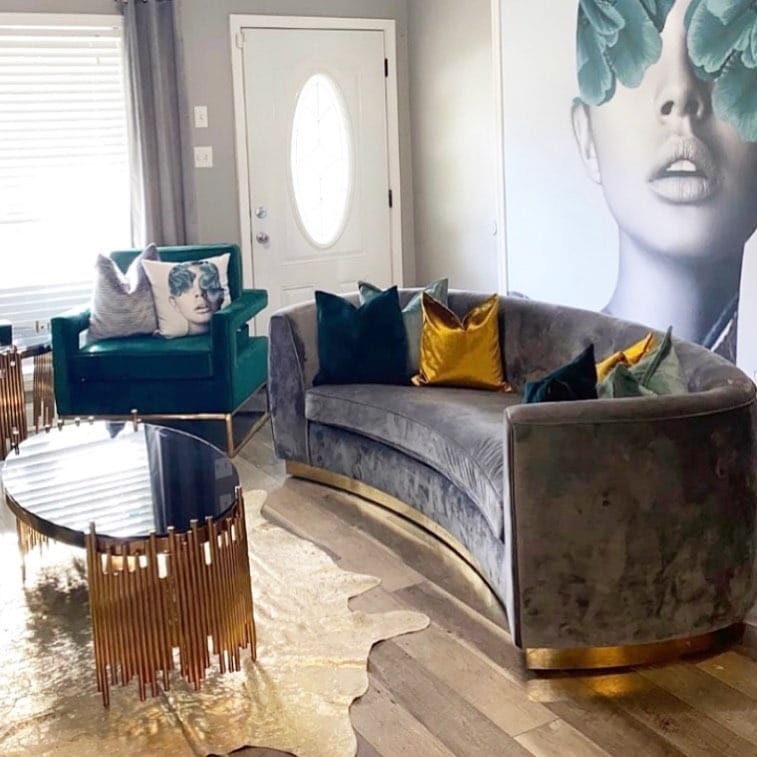 20. Glam Grey Living Room with Curved Gold-Trim Seating - grey and gold living room ideas