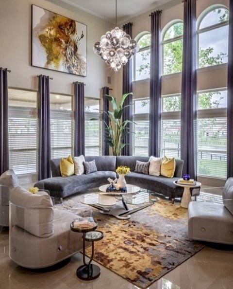 22. Grand Grey Living Room with Statement Gold Lighting - grey and gold living room ideas