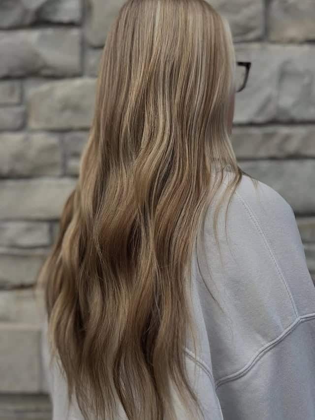 7. Long Layered Blonde with Warm Lowlights - Blonde Hair with Lowlights