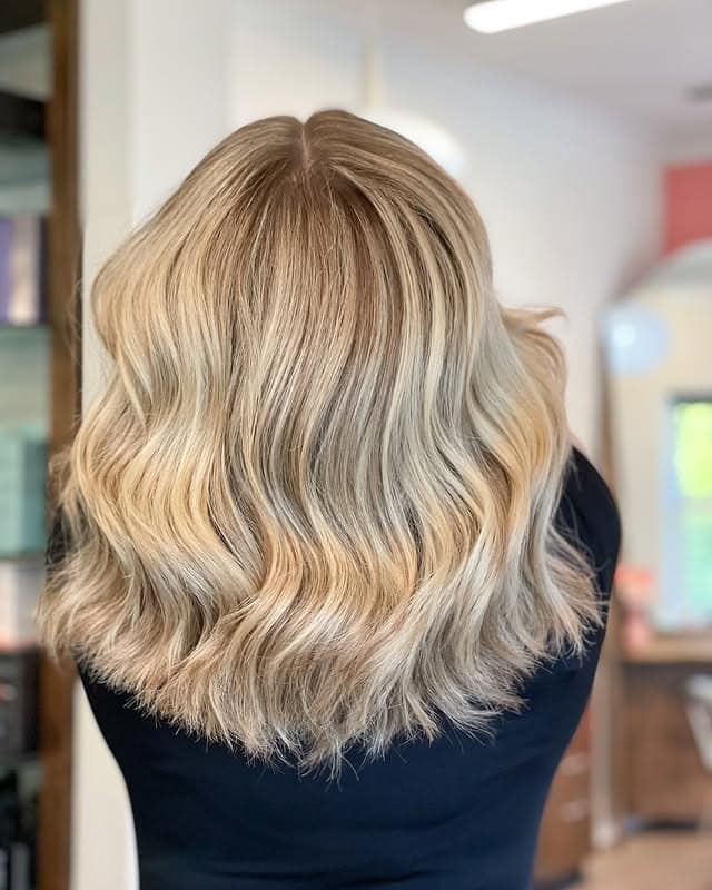 13. Wavy Blonde Lob with Rooted Lowlights - Blonde Hair with Lowlights