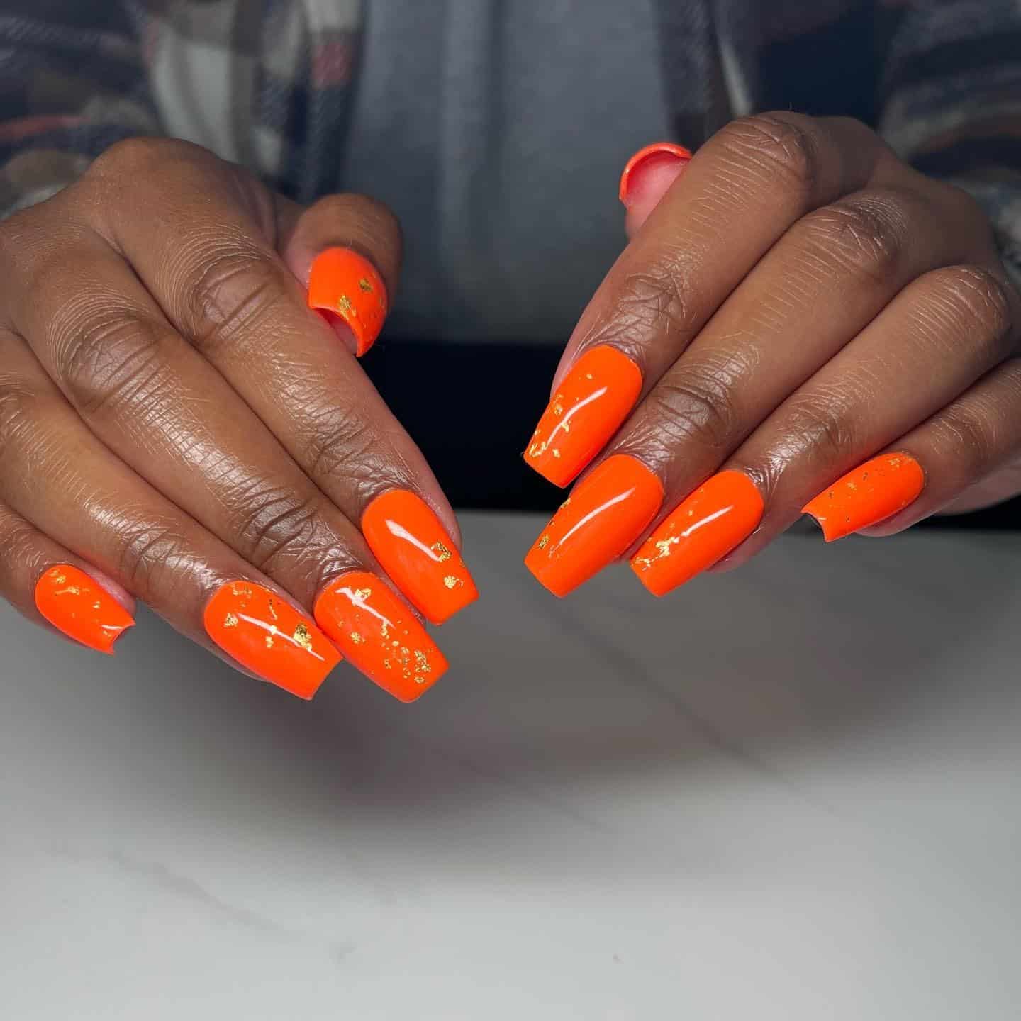 1. Bright Tangerine Gloss Square Nails - medium length square nail ideas
