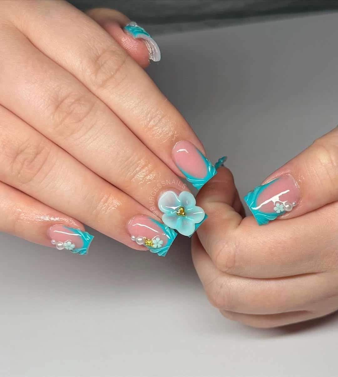 7. Turquoise Floral Accent Square Nails - medium length square nail ideas