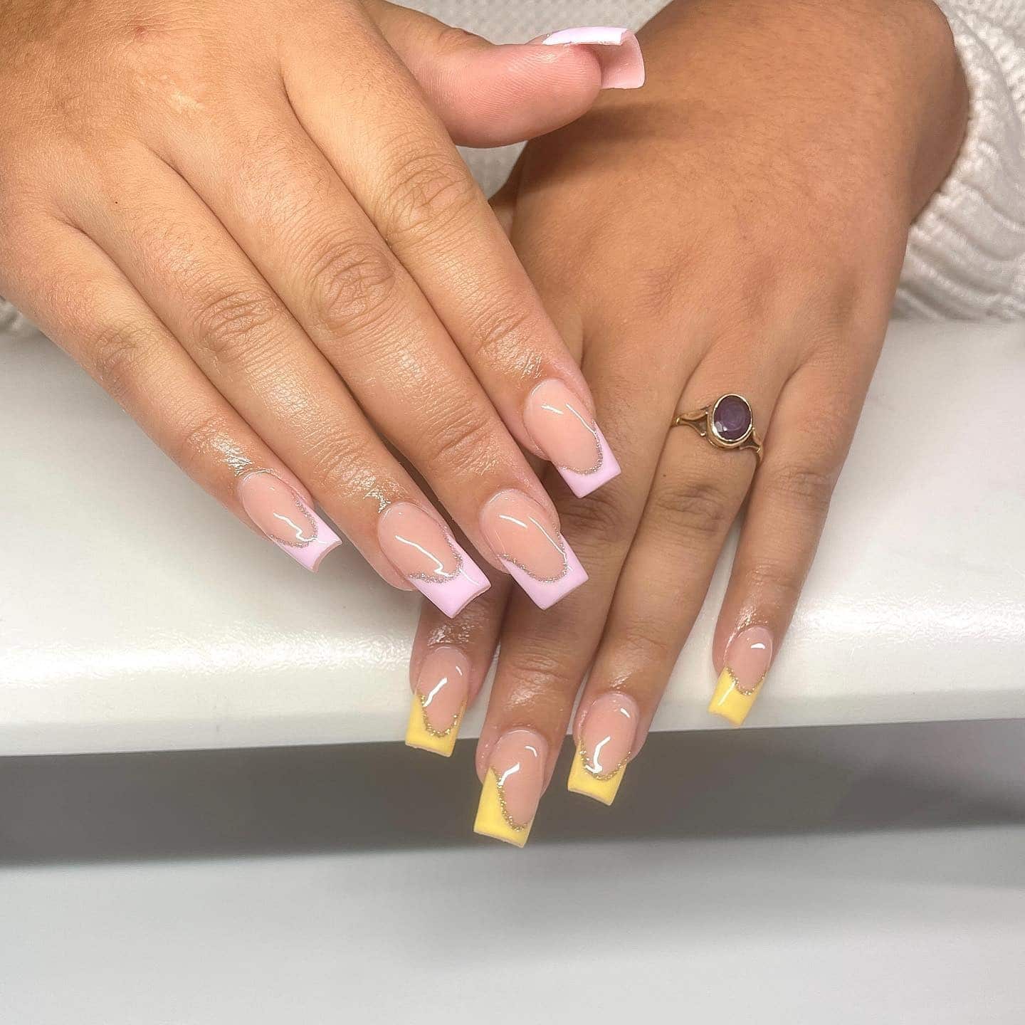 8. Pastel Yellow and Pink French Squares - medium length square nail ideas