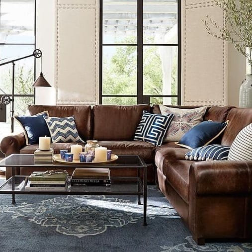 6. Transitional Comfort with Deep Leather Seating - brown leather sofa living room ideas