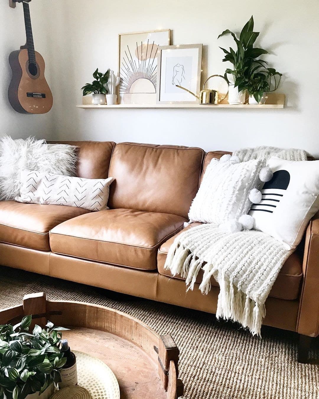 9. Layered Textiles and Leather for a Cozy Look - brown leather sofa living room ideas
