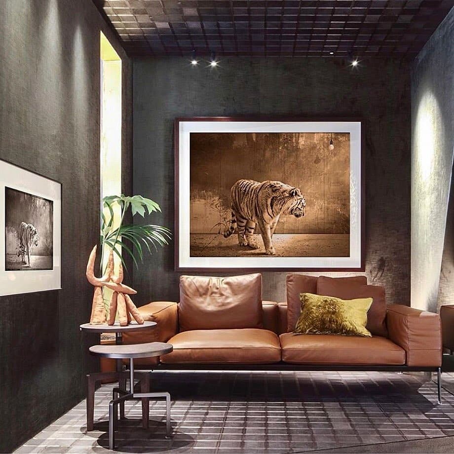 15. Art-Focused Space with Leather Seating - brown leather sofa living room ideas