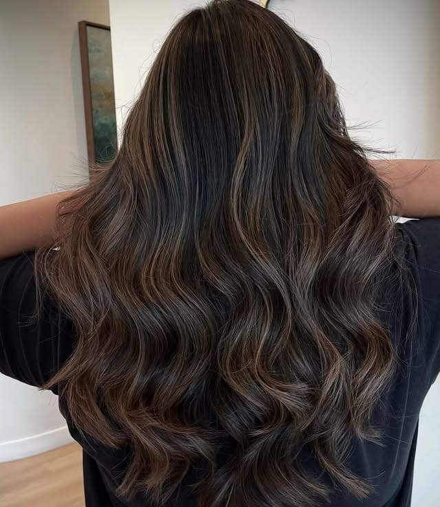 10. Deep Brown Waves with Balanced Light Placement - Brown Hair with Highlights