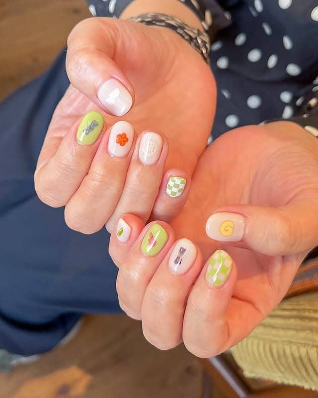 12. Light Green Graphic Accent Nails - minimal nail ideas