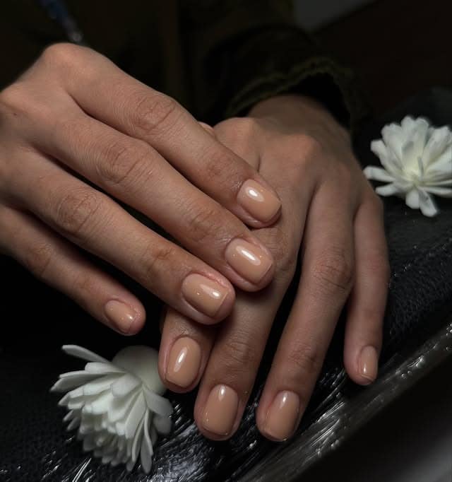 15. Classic Beige Short Nails - minimal nail ideas