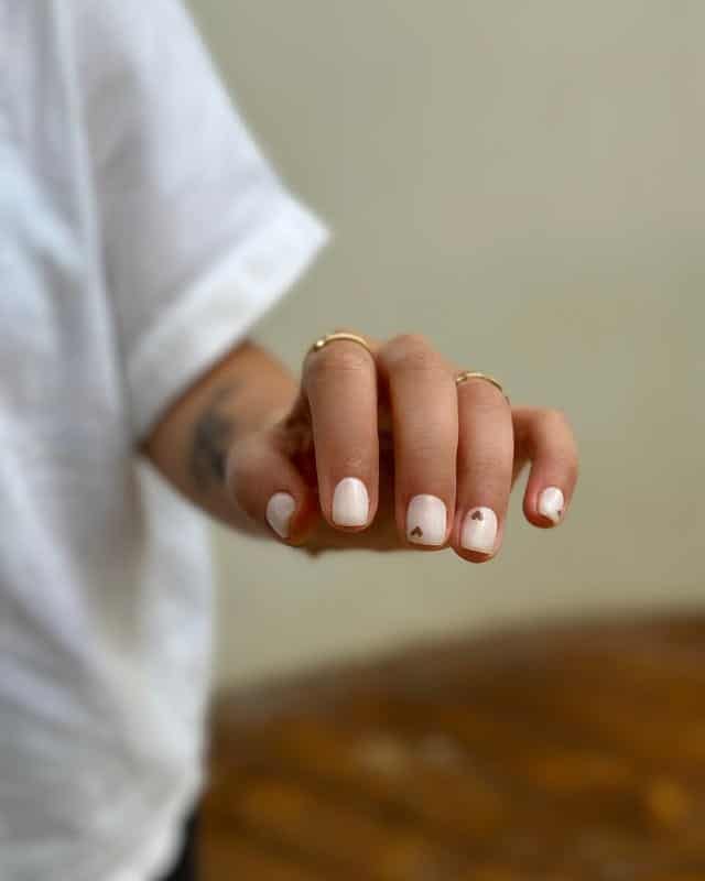 22. Soft White Minimal Heart Nails - minimal nail ideas