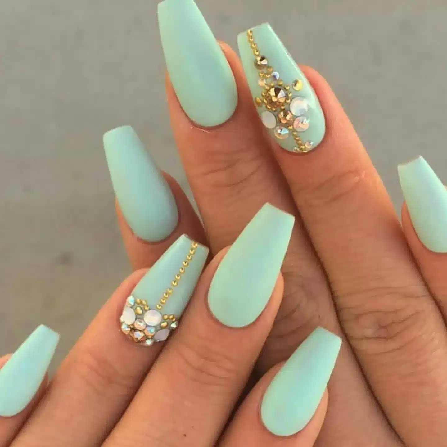 7. Mint Crystal Accent Coffin Nails - mint color nail ideas