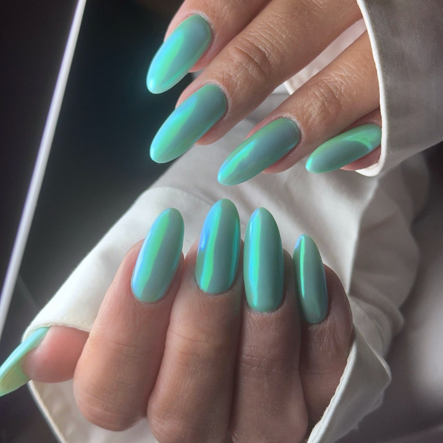 8. Iridescent Mint Chrome Almond Nails - mint color nail ideas