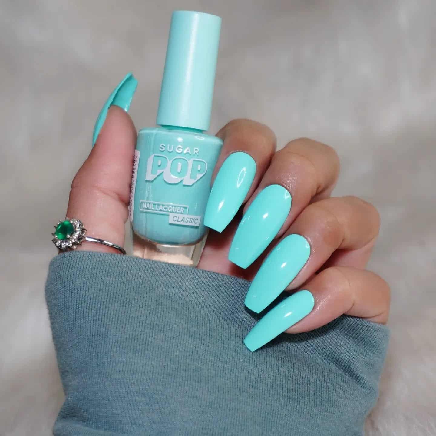 10. High-Gloss Mint Coffin Statement Nails - mint color nail ideas