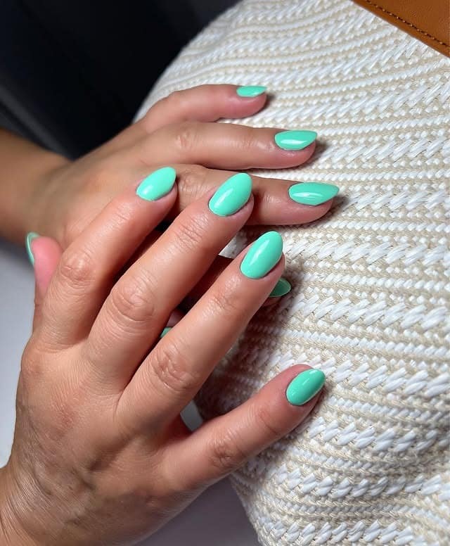 17. Soft Mint Oval Nails with Natural Finish - mint color nail ideas