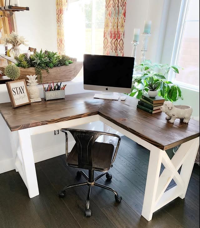 18. Collected Farmhouse Office with White Desk and Mixed Wood Finishes - farmhouse office ideas