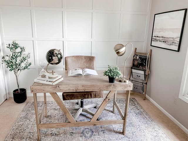 22. Minimal Farmhouse Office with Soft White Walls and Natural Oak Desk - farmhouse office ideas