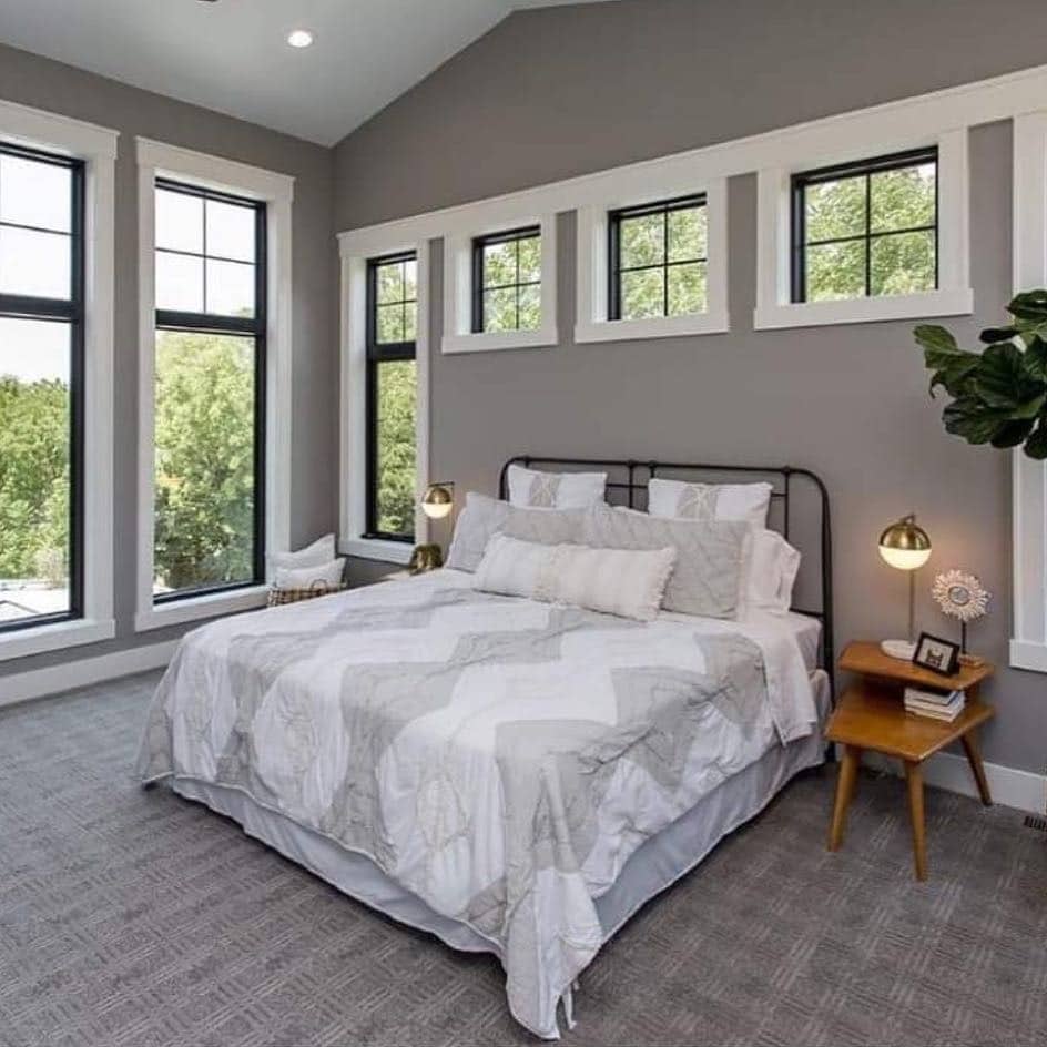 3. Airy Architectural Gray Retreat - gray wall bedroom ideas