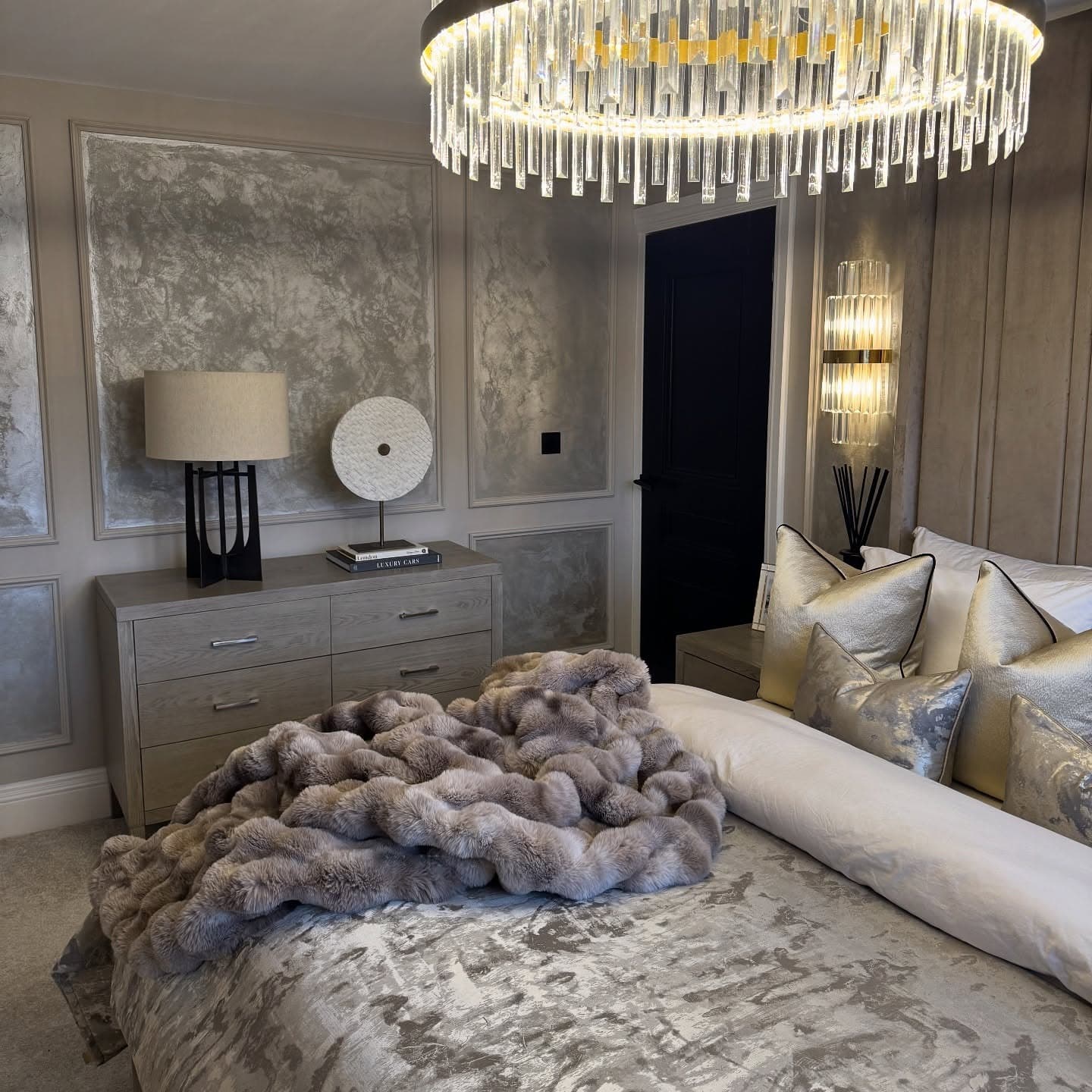 5. Glam Gray Bedroom with Metallic Accents - gray wall bedroom ideas