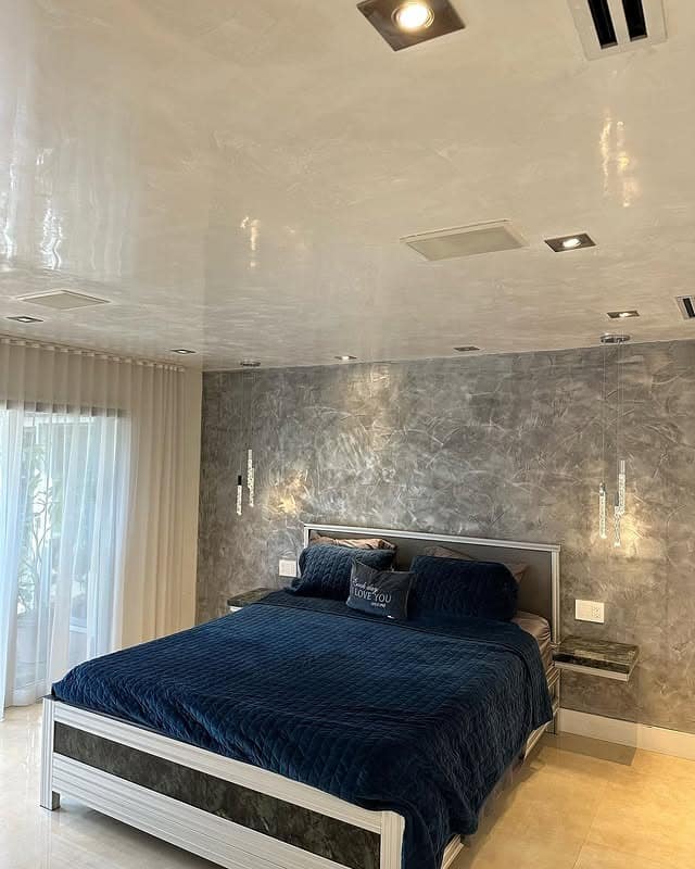 19. Textured Gray Finishes with Deep Contrast - gray wall bedroom ideas