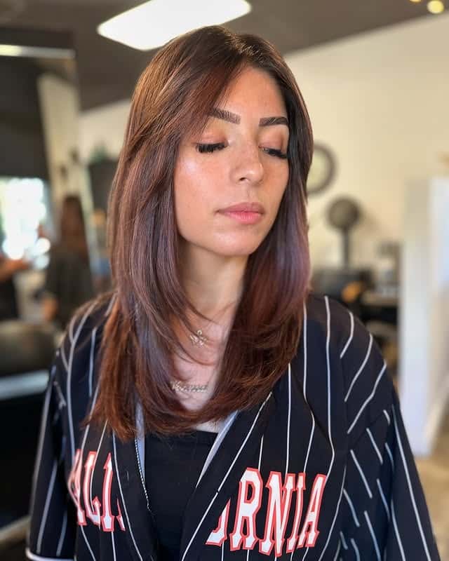 10. Layered Medium-Length Cut in Cool-Toned Auburn - Auburn Hair Color