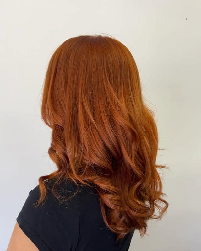 13. Long Layered Waves in Copper Auburn - Auburn Hair Color